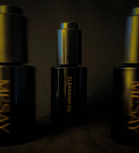 Blurred image of Cleansing Oil in a trio
