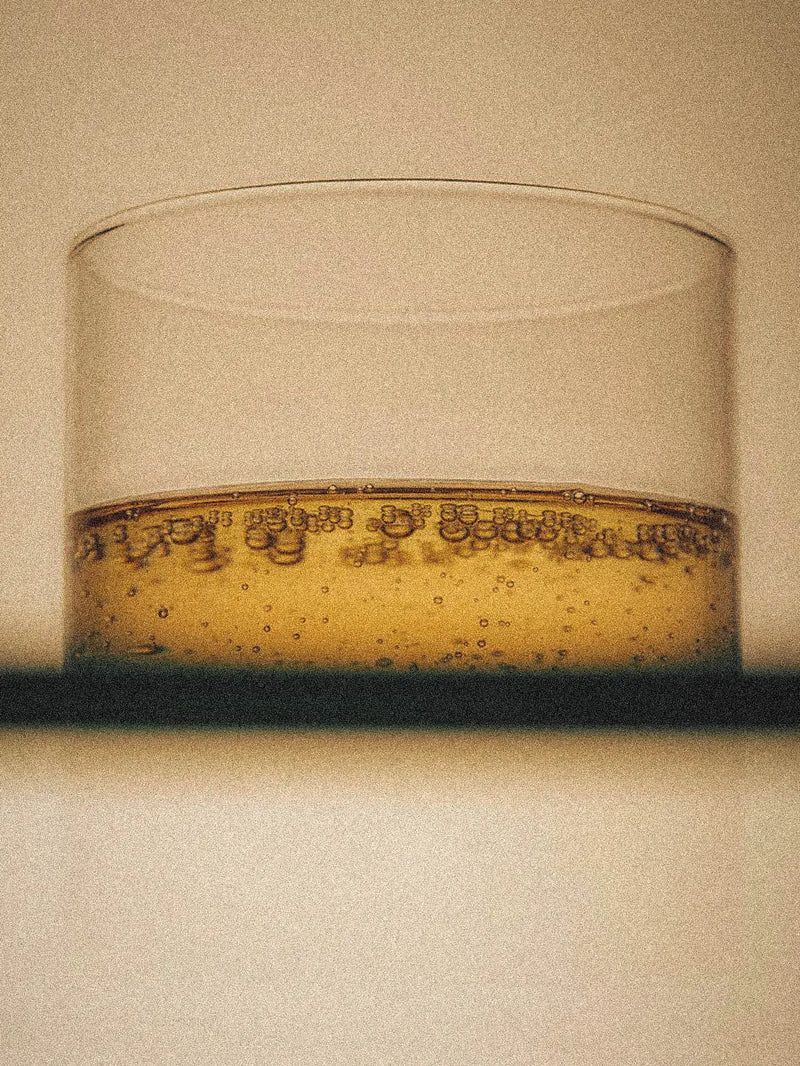 our beautiful oil, sitting in a glass beaker, imbuing